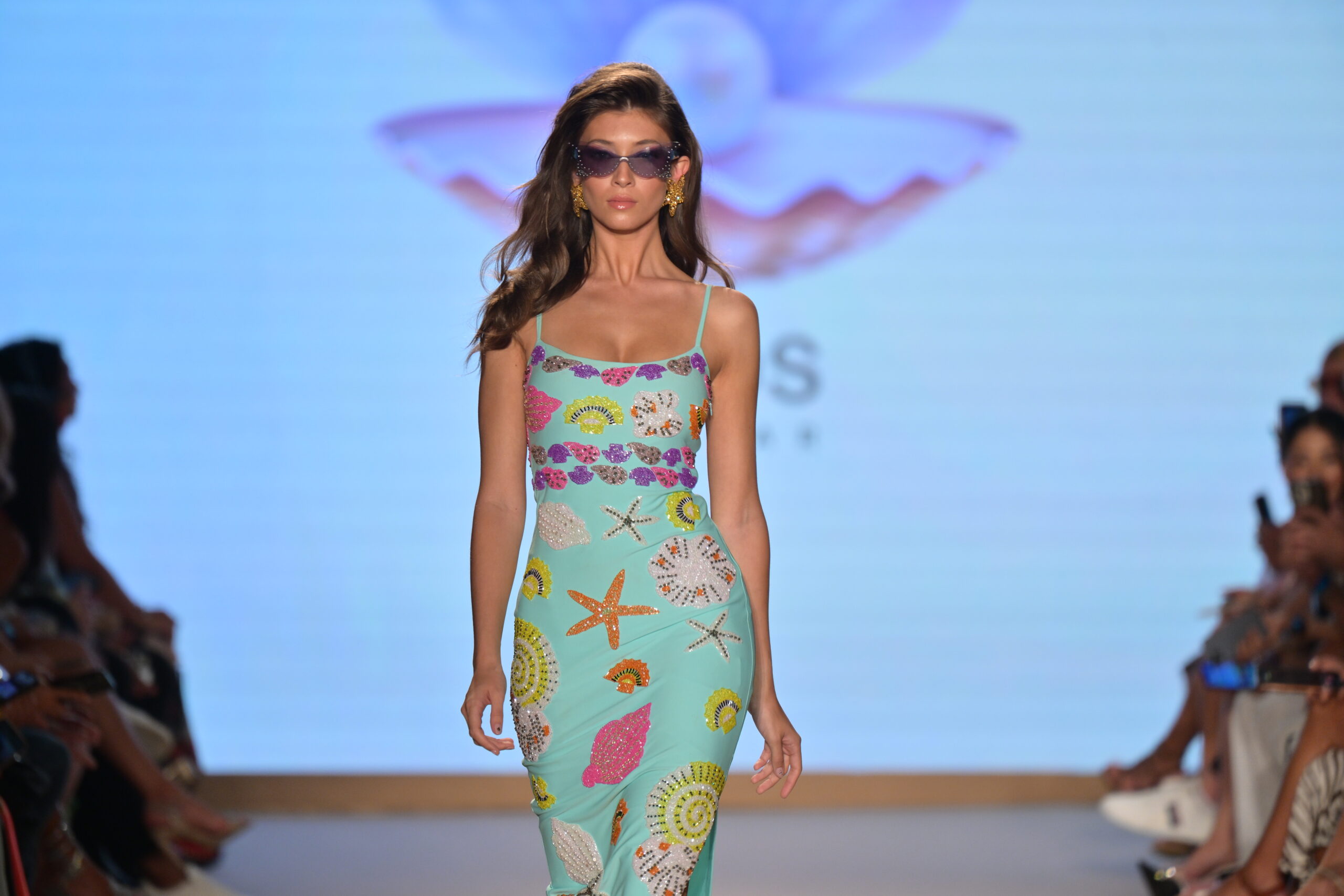 Laura Margesin walking in Oceanus’ ‘Sol del Trópico’ collection for the “Oceanus x Sojos” runway show at Paraiso Miami Swim Week 2025, wearing the New York Strapped Dress – Photo by Simon Soong, courtesy of Paraiso and Miami Swim Week
